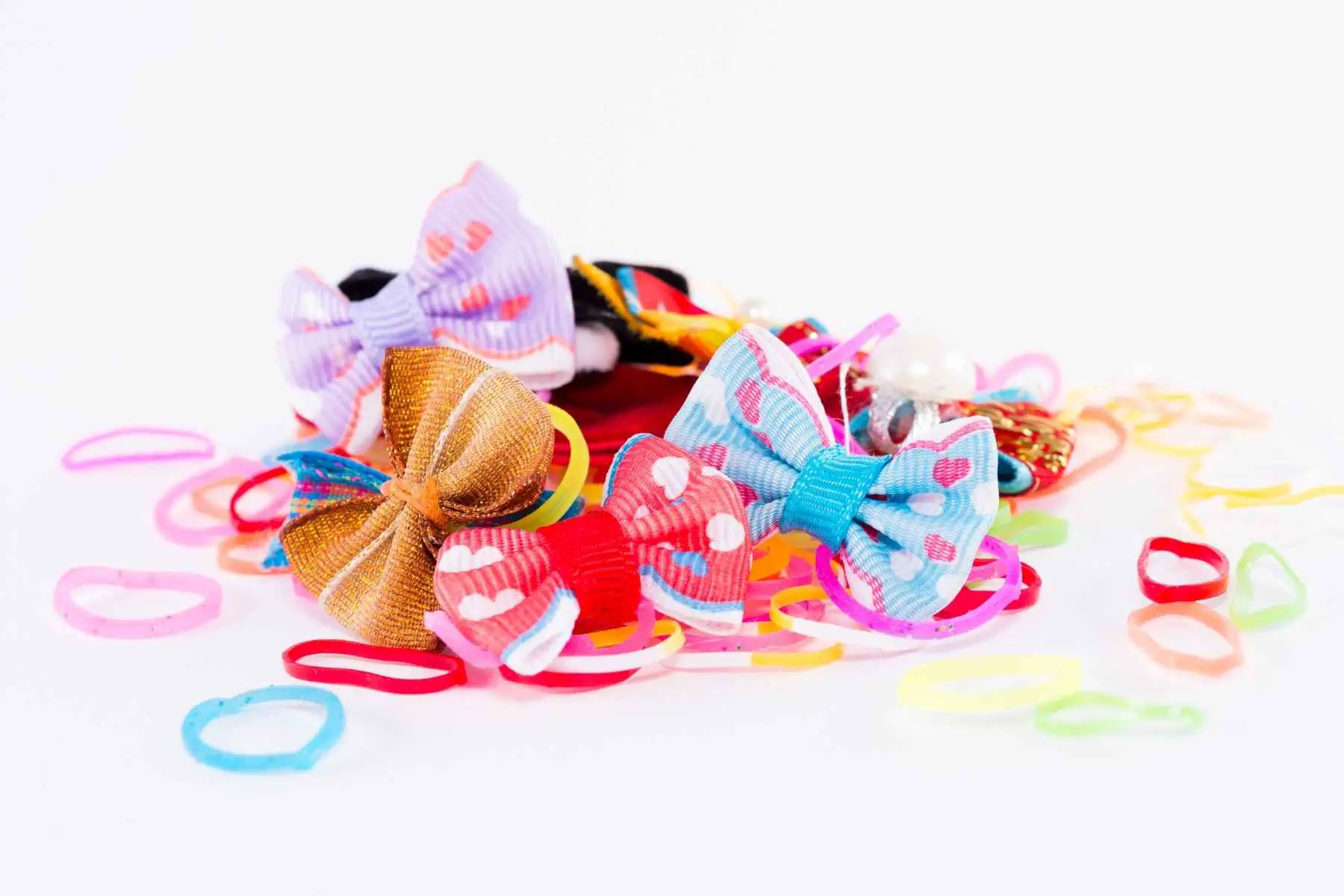 A large number of hair ties in bright colors