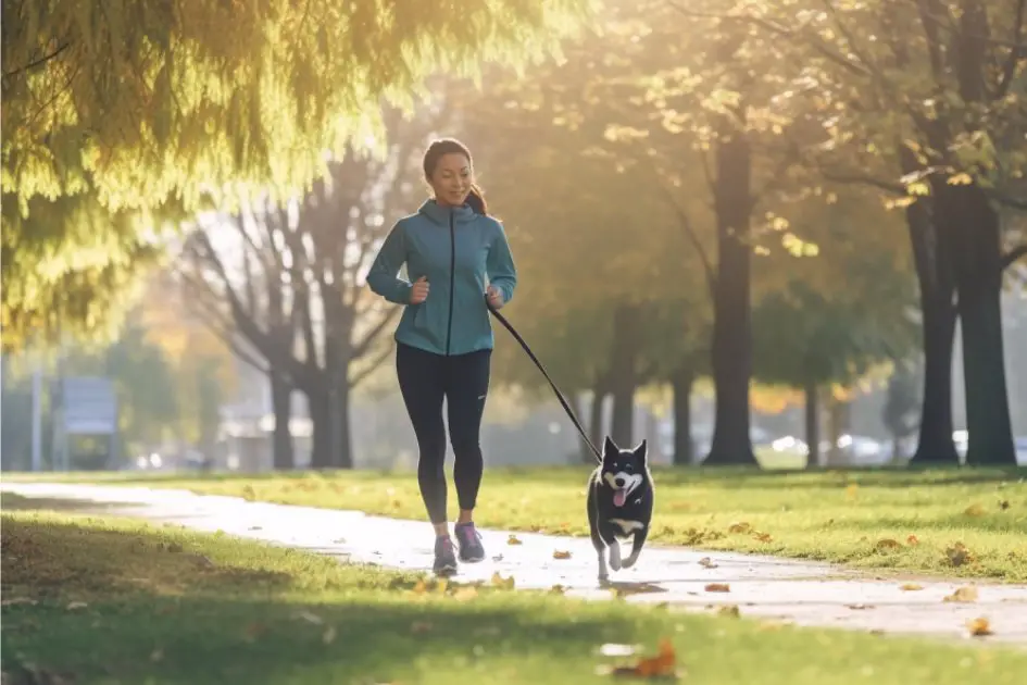 Woman jogging with her dog